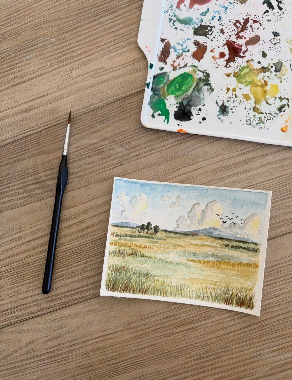 Watercolor of a golden field